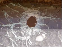 bullet hole glass.jpg